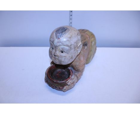 A vintage wooden carved Chinese figure (possibly a Opium pillow) 