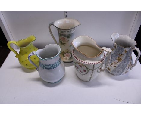 Five assorted ceramic jugs, shipping unavailable 