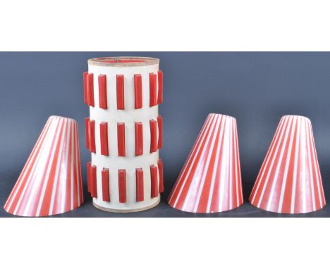 A collection of retro vintage mid 20th century lightshade comprising of a tubular lightshade with a repeating red bar motif t
