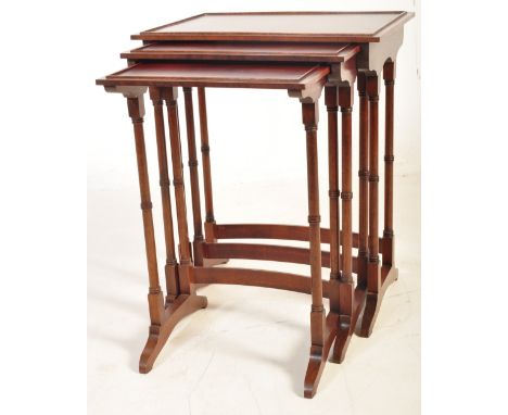 A Regency revival 20th century mahogany nest of tables. Raised on turned legs with graduating tops to each table, the bamboo 