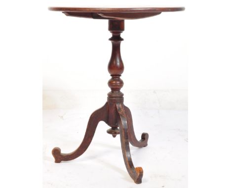 An 18th Century George III mahogany tilt top table. The table having a solid mahogany top (heavy staining) of&nbsp; circular 