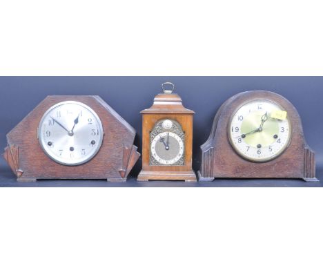 A group of three retro 20th century oak mantle clocks to include a Smiths Napoleon mantle clock, a W. Wells &amp; Sons Art De
