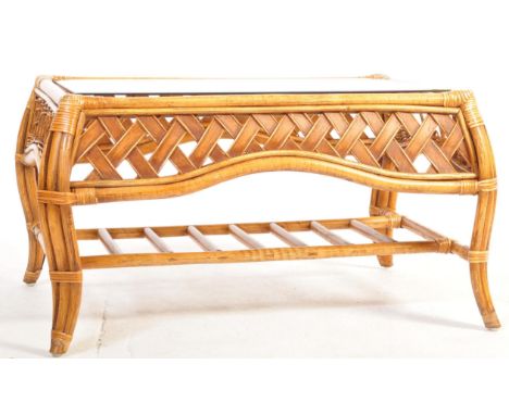 A retro vintage mid 20th century bamboo rattan coffee table in the manner of Franco Albini having a rectangular smoked glass 