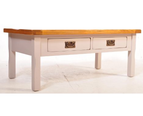 A contemporary Oak Furniture Land St Ives range coffee centre table of rectangular form with a set of two drawers beneath ove