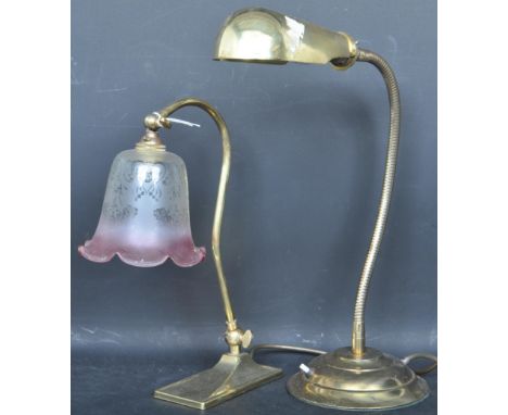 A collection of vintage 20th century lamps comprising of a lamp having a peach glass shade raised on an adjustable brass supp