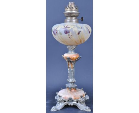 An early 20th century Art Nouveau style oil / paraffin lamp in the manner of Legras. The lamp having a hand painted polychrom