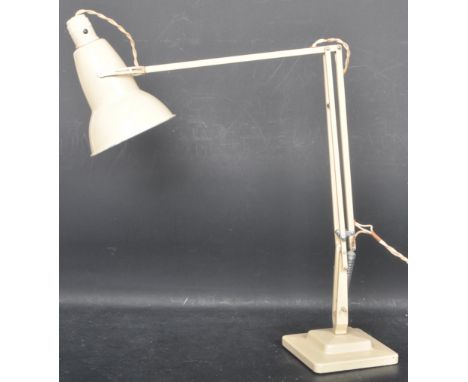 A retro vintage 20th century pre war Herbert Terry anglepoise industrial desk top lamp having a conical shade, three arm supp