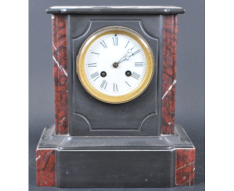 A 19th century Victorian slate 8 day mantel clock&nbsp; by Samuel Martine &amp; Co of France. The clock having a flared top, 