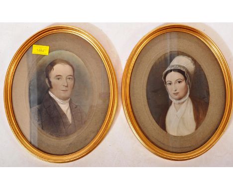 A pair of 19th century Victorian 19th century hand coloured watercolour prints. The oval portrait paintings to depict a young