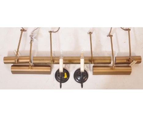 A mixed group of modern light fittings two include a pair of antique style wall sconces finished in black with scroll mounts 
