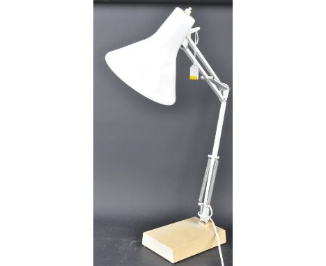 Two retro vintage industrial desk top lamps comprising of a industrial desktop lamp having a metal conical shade with adjusta