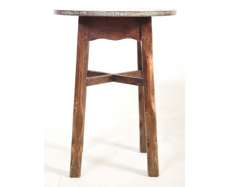 A 19th century Victorian Arts &amp; Crafts copper and oak tavern table. Raised on oak legs with chamfered edge detailing unit