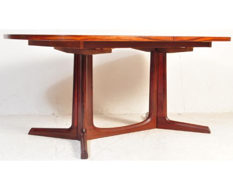 Niels Otto Moller (1920-1982)A retro solid teak dining room table being raised on squared&nbsp; and splayed legs with hidden 