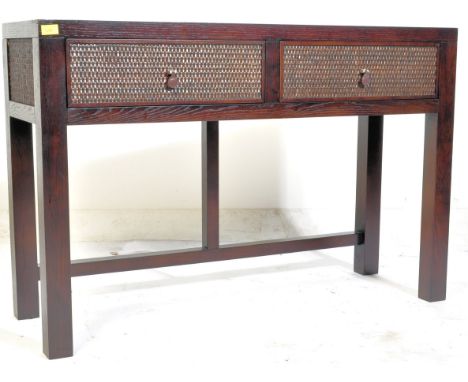 A late 20th century mahogany David Martin console hall table. The table having a rectangular table top being raised over squa