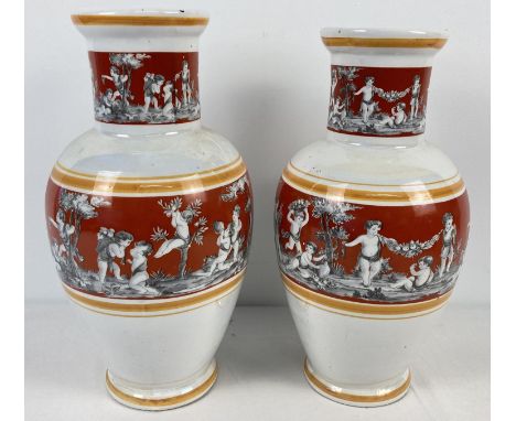 A pair of vintage ceramic vases with lustre glaze and panelled design depicting cherubs. Of bulbous form with wider lipped ri