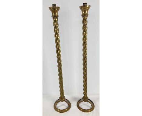 2 vintage brass twist stem stands, possibly originally from light fittings. Each stand approx. 74cm tall. 