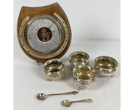 A set of 4 matching A1 silver plated salts with decorative scroll detail, raised on tripod ball feet. Together with 2 vintage