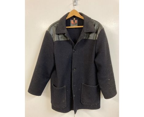 A vintage dark blue wool Donkey Jacket with vinyl shoulder panel by Dudes. Button fastening with two front pockets. Size XL. 