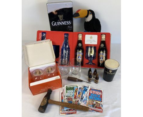 A collection of vintage Guinness collectables and memorabilia. To include Guinness bottle wooden gavel, miniature bottles, a 