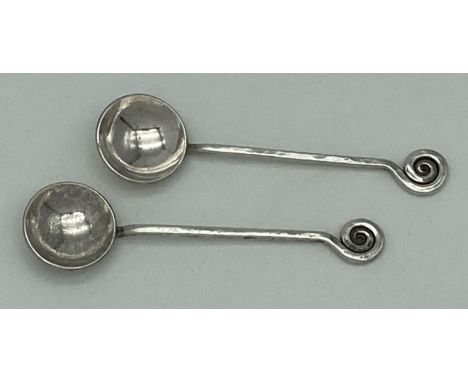 A pair of mid century Kurt Jobst sterling silver South African salt or condiment spoons. With Arts &amp; Crafts inspired spir