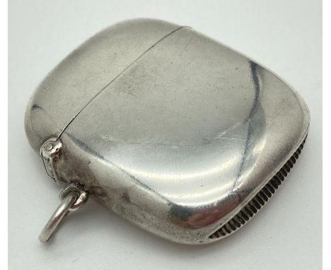 A large round edged Victorian silver vesta case hallmarked for Deakin &amp; Francis Ltd, B'ham 1900. Hinged lid snaps shut fi