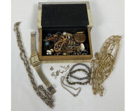 A box of vintage and modern costume jewellery to include necklaces, bracelets and earrings. 