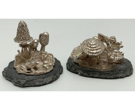 2 miniature cast silver mythical scenes featuring pixies &amp; toadstools, mounted on slate bases. Both fully hallmarked, Lon