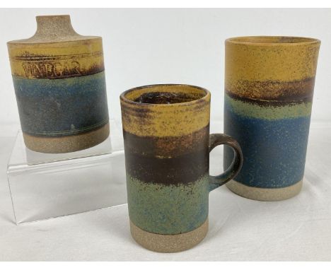 3 pieces of mid century Robin Welch stoneware studio pottery in blue/green colourway. A 5.5" tubular vase, a slimline mug and