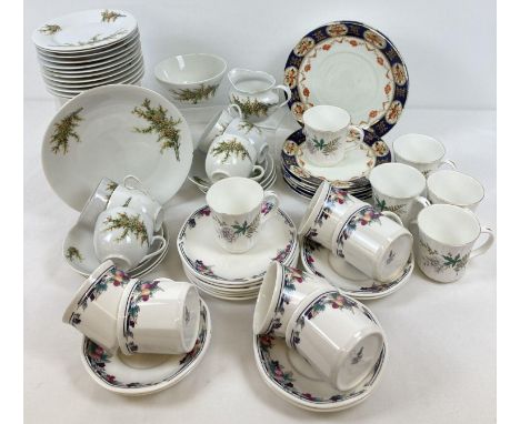 A box of assorted vintage and modern bone china tea ware. Lot includes: an 18 piece Royal Doulton tea set in "Autumn Glory" p