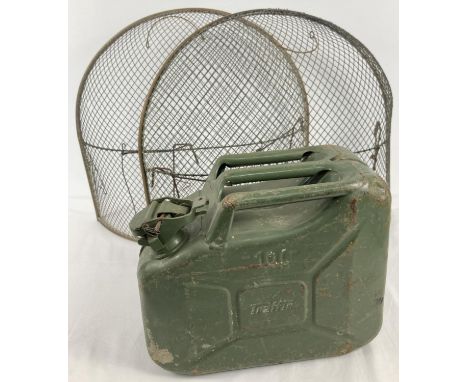 A green painted 10ltr "traffic" gerry can together with 2 vintage metal dome shaped fire guards. Guards approx. 47cm tall. 