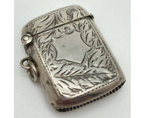 A Robert Pringle &amp; Sons Edwardian Silver vesta case with engraved foliate detail front &amp; back. Curve shaped back and 