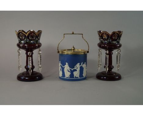 A Wedgwood jasperware biscuit barrel, late 19th/20th century, decorated with classical maidens, 16cm high, together with a pa