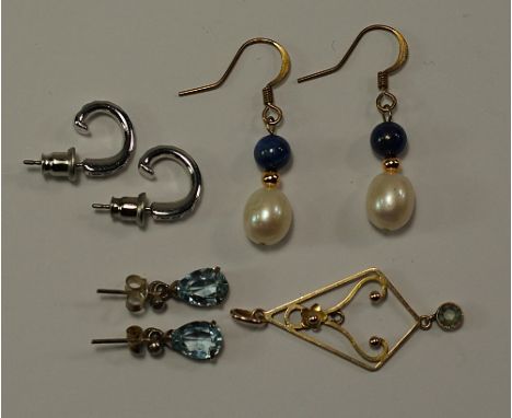 A pair of pearl and lapis lazuli earrings, on yellow metal hooks, together with a pair of silver and aquamarine pear shape ea