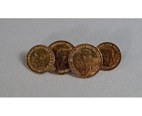 A pair of gold gentleman's cufflinks, fashioned as full and half sovereigns, probably 9ct gold, the sovereign style front bea