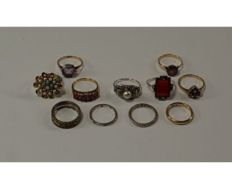 A collection of gold, silver and costume rings, to include a 14ct gold and ruby double row ring, approx 3.4g, six 9ct gold an