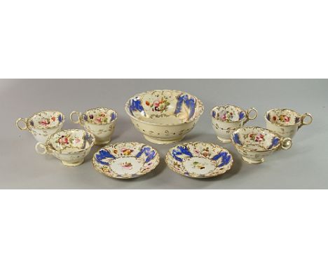 An English porcelain part tea and coffee service, probably Staffordshire, mid 19th century, decorated to the interior with vi