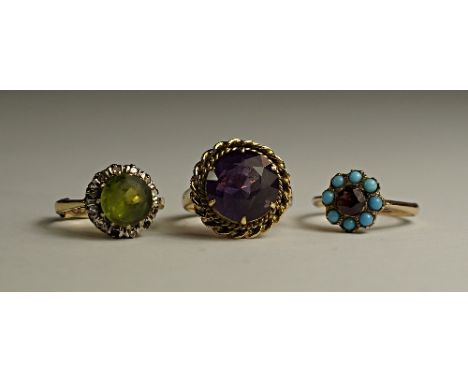 A 14ct gold and amethyst ring, in rope twist mount, approx size M/N, together with a garnet and turquoise cluster ring, unmar