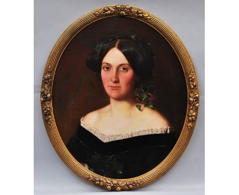 British School, mid 19th century- Portrait of a lady, quarter-length in a black dress with white lace trim; oil on panel, ova