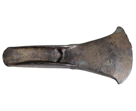 Bronze Age, c. 1500-1100 BC, an unlooped palstave with a triangular blade with curved cutting edge, square butt with deep poc