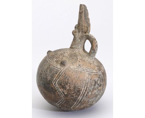 Bronze Age, Cyprus, c. 2300 -2100 BC, a red polished ware jug, partly black with cut away spout with pierced ears either side