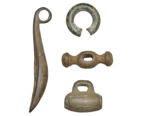 Celtic, bronze artefacts (4), including cosmetic or woad grinder, crescent shaped mortar with a suspension loop; strap fasten