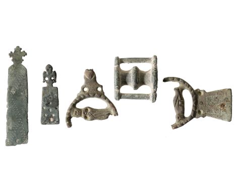 Medieval, c. 1400, brass belt chape, rectangular riveted plate with an openwork circular central panel containing two standin