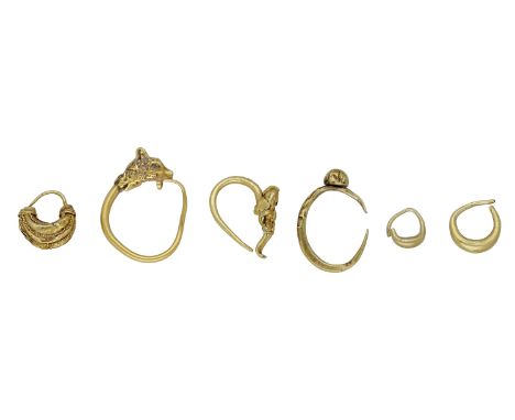 Eastern Roman, gold cherub Earring, c. 3rd century, modelled as a winged cherub or Eros, wearing a beaded sash, loop fitting 