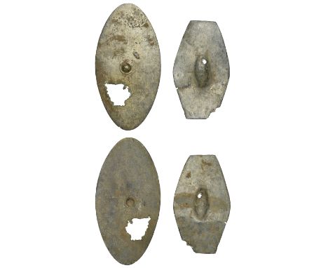 Iron Age, miniature bronze votive shields (2), oval with central raised circular dome, 6.1 x 3.2 cm; lozenge-shaped with cent