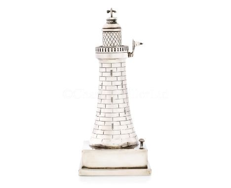 A NOVELTY SILVER ELECTRIC 'LIGHTHOUSE' LIGHTERthe removable 'lamp' housing with hinged top to wick and flint, reservoir stopp