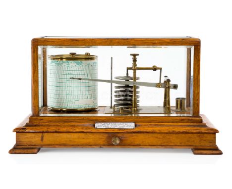 SIR WINSTON CHURCHILL'S BAROGRAPH, CIRCA 1920unsigned, oak case mounted with brass bed plate, seven pressure capsules to reco