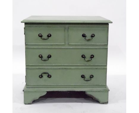 Painted filing cabinet in the form of a chest of drawers, with dummy drawer front, raised on bracket feet, width 63cm 