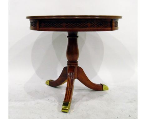 Reproduction walnut circular tripod table with reeded splayed legs, on brass feet, 66cm diameter 