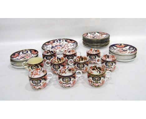 Royal Crown Derby part tea service, Imari pattern, comprising 10 cups, 12 saucers, 10 tea plates and two cake plates 