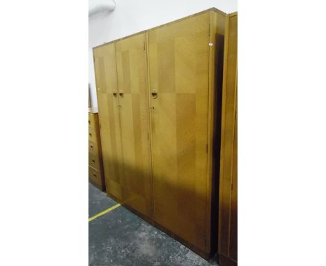 Enfurn mid 20th century light oak bedroom suite to include tall chest of five drawers, dressing chest of three drawers and tw